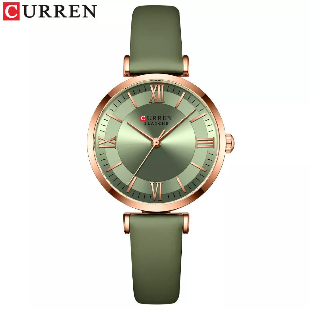 Montre femme Curren 9079 avec un bracelet en cuir vert clair, idéale pour un look frais et moderne