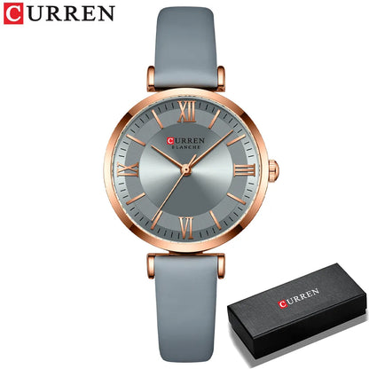 Montre chic pour femme de marque Curren avec un bracelet en cuir bleu marine et un cadran élégant avec boite