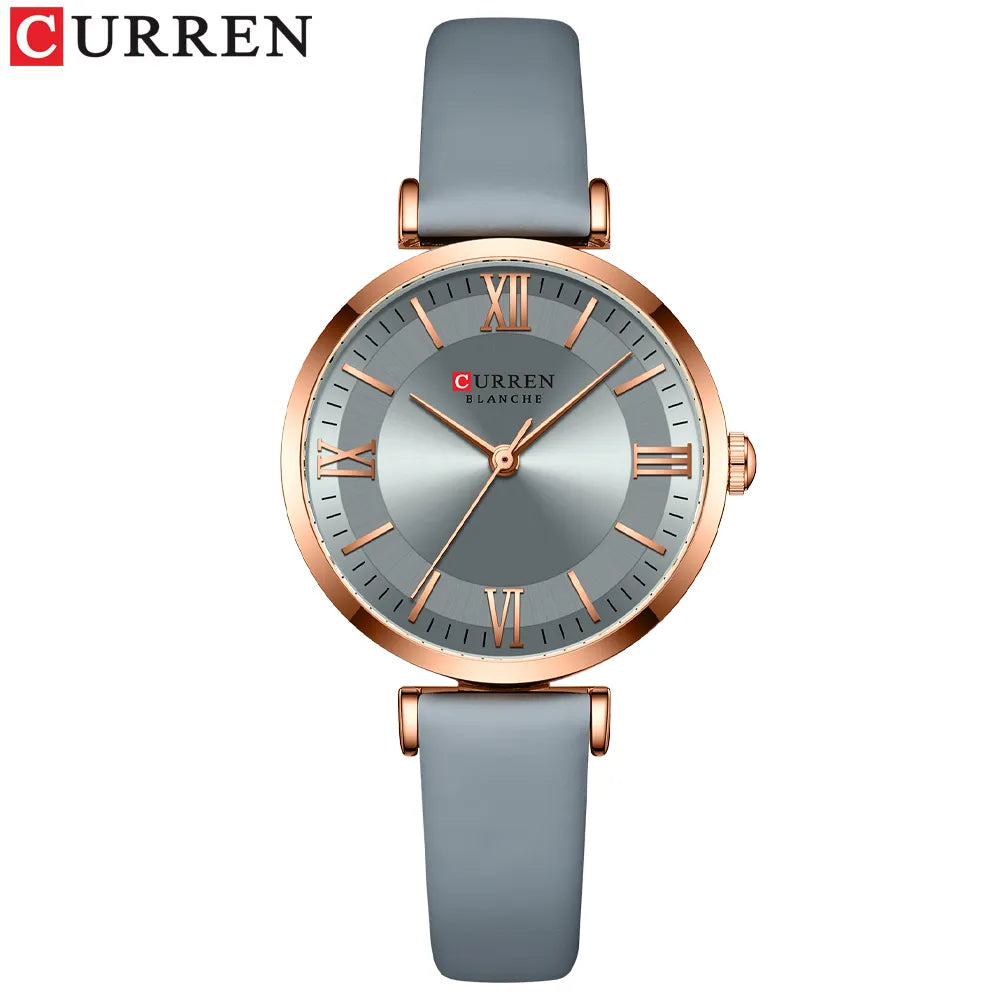Montre chic pour femme de marque Curren avec un bracelet en cuir bleu marine et un cadran élégant