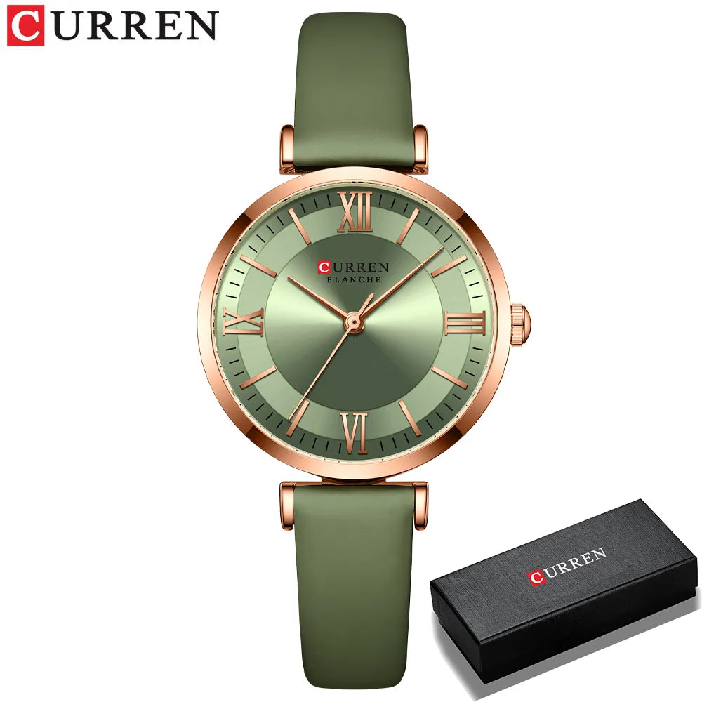 Montre femme Curren 9079 avec bracelet en cuir vert clair présentée dans son coffret cadeau